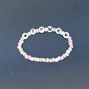 handmade "treat people with kindness" bracelet